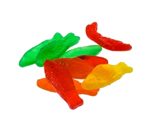 Swedish Fish Assorted gummy candy in red orange yellow and green